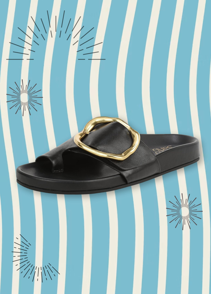 Dark leather sandal with a large round buckle